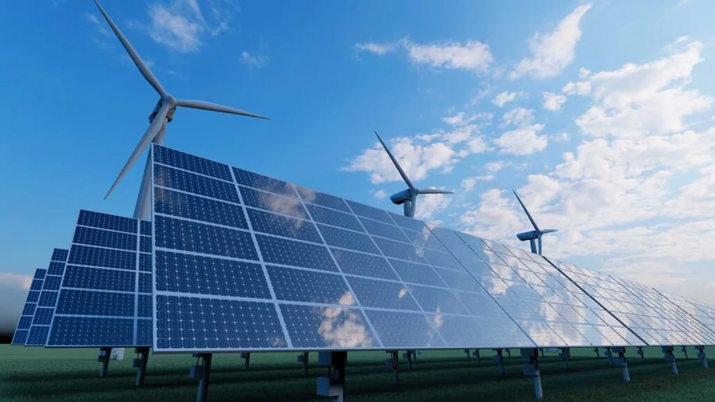 Wind turbines and solar panels in a renewable-energy landscape